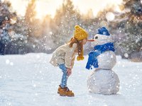 girl with snowman.jpg