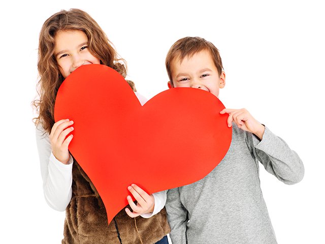 brother & sister with red heart isolated.jpg