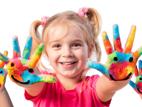 preschooler with painted hands.jpg